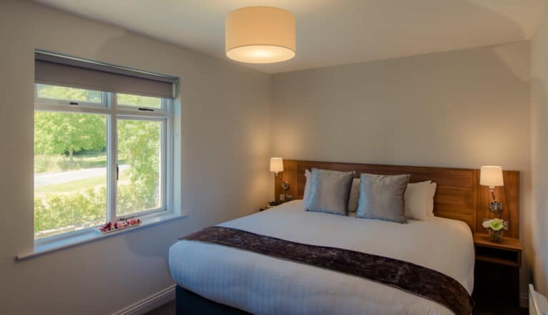 Tulfarris Hotel & Golf Resort Holiday Lodge double bedroom window with view