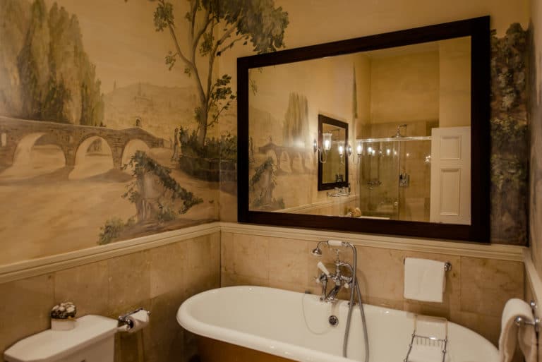 Tulfarris Hotel & Golf Resort bridal suite bathroom with large mirror over bath